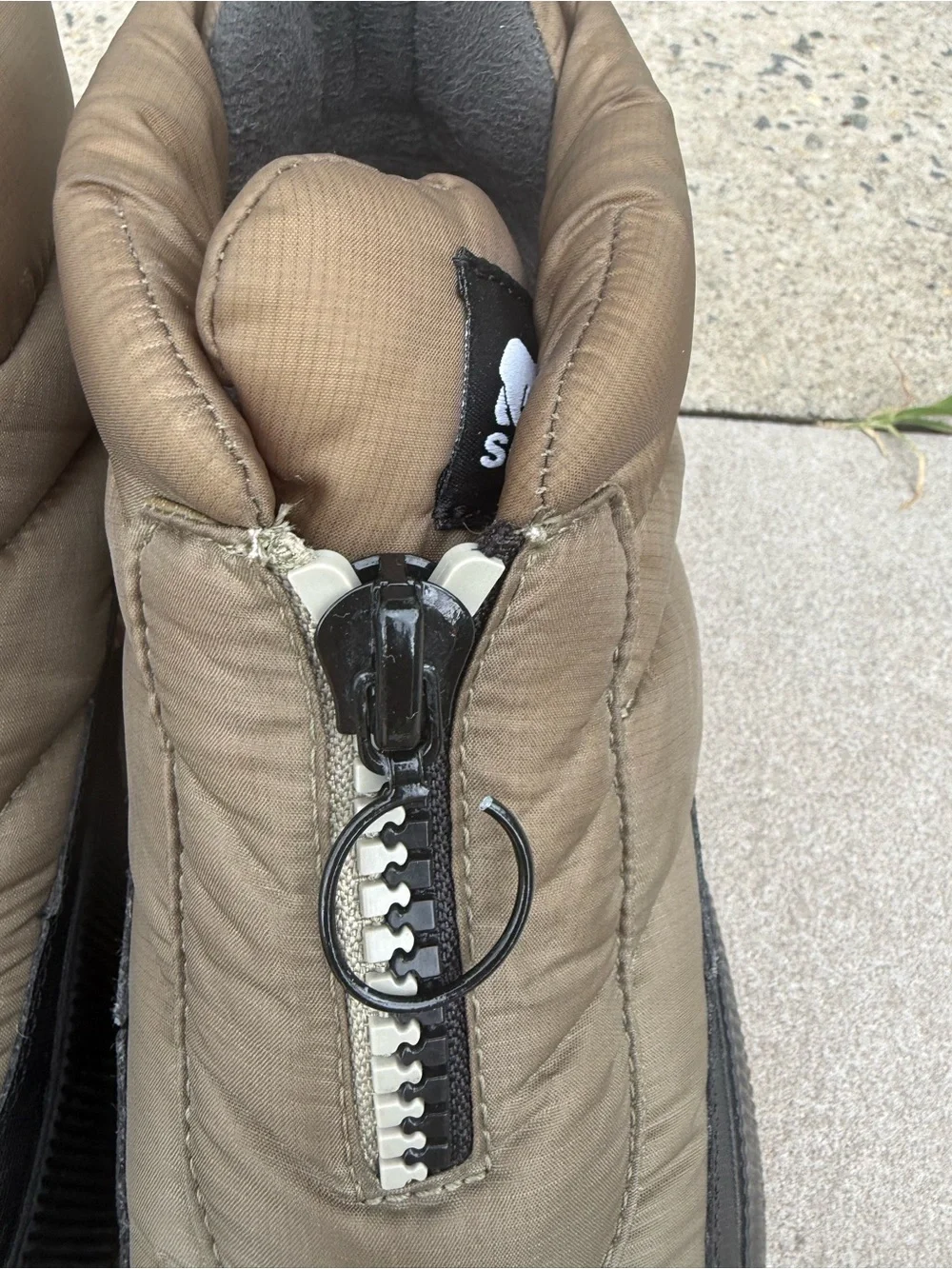 Sorel Olive Green and Black Quilted Slip-On Winter Sneakers with Pink Accent